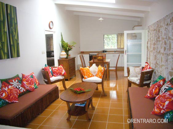 cosy living area with kitchen in the background at Lyas Holiday Rental, Rarotonga, Cook Islands