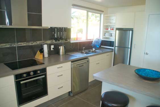 kitchen is well organised and beautifully appointed at Areora Beachfront Escape, Rarotonga, Titikaveka