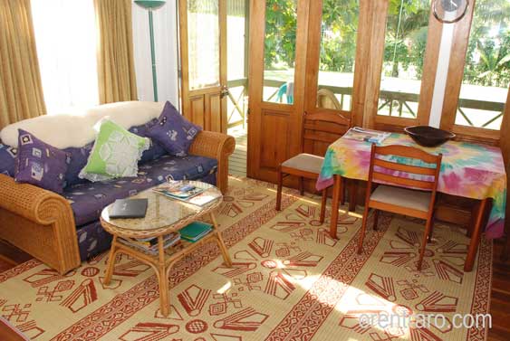cane furnishings and frenchdoors to the outside veranda