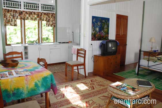 beutifully decorated living area showing kitchen and table at Aroa Bungalow, Rarotonga Cook Islands