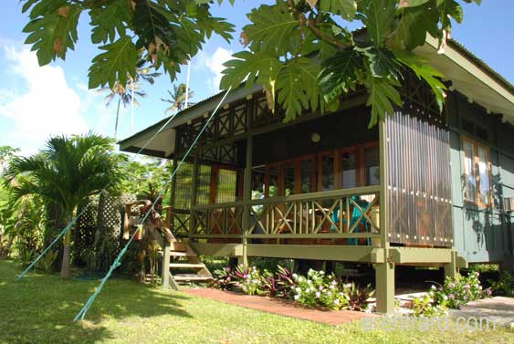 Aroa Bungalow exterior with french doors