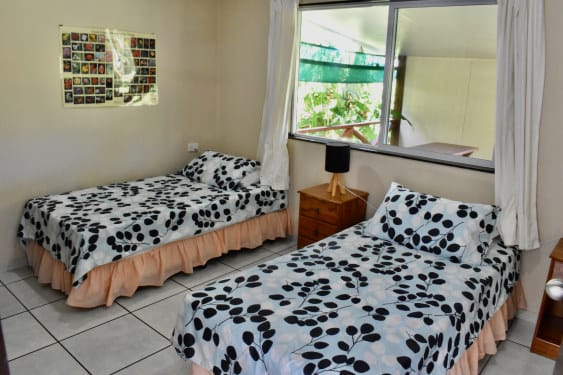 the second bedroom has two singles at Kia Manuia, Rarotonga, Cook Islands