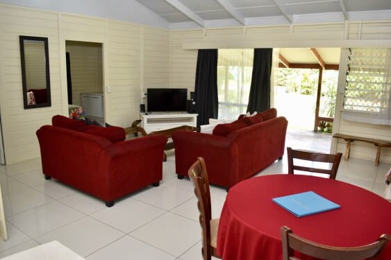 living area with lounge and dining room seating at Macs